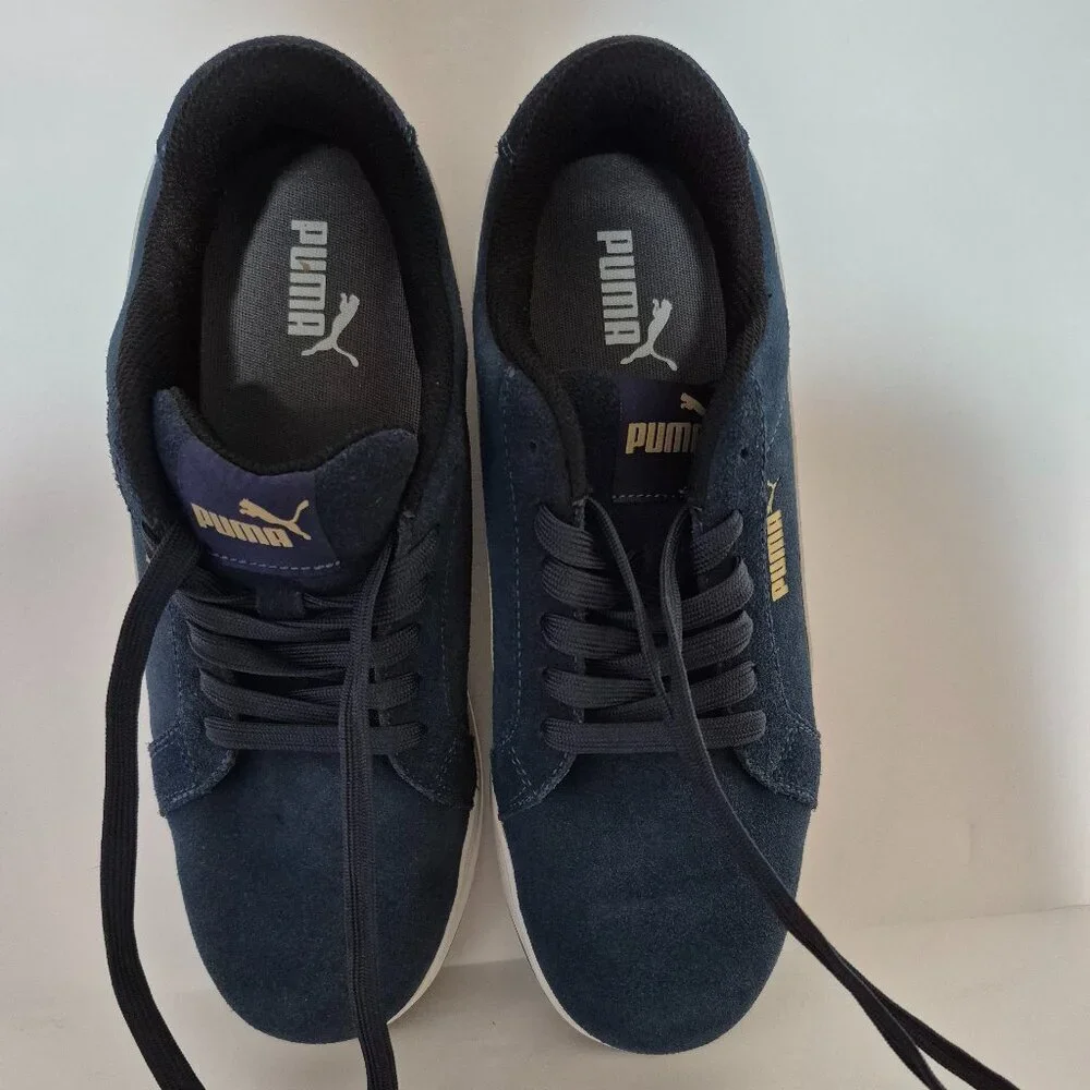 Puma men's hard toe safety shoes, size 10.